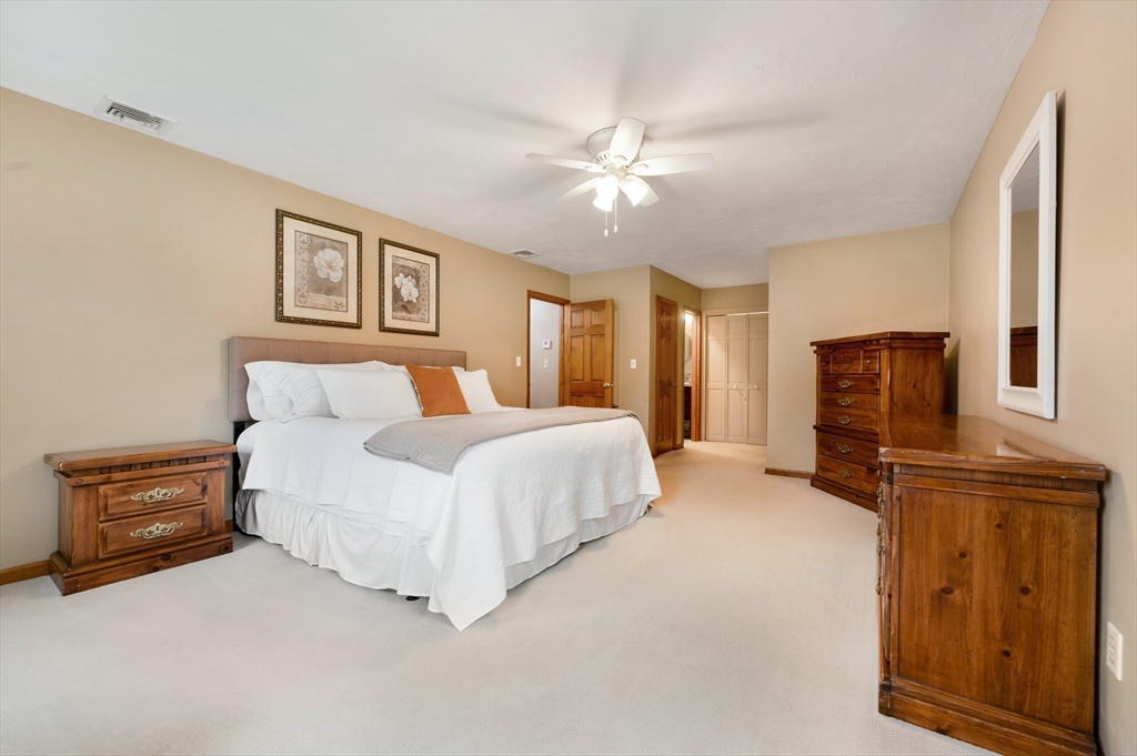 206 Olde Forge Road Hanover, MA 02339 - Photo 21 of 42 a bedroom with a bed and a television
