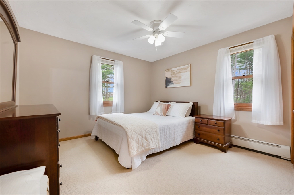 206 Olde Forge Road Hanover, MA 02339 - Photo 25 of 42 a bedroom with a bed and a window
