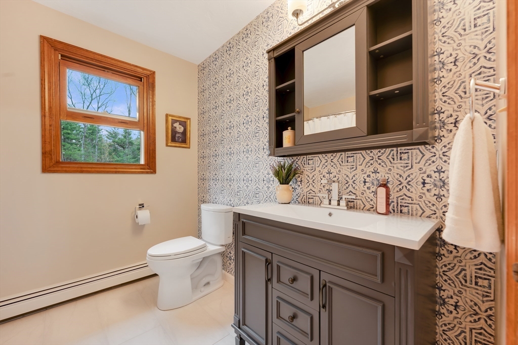 206 Olde Forge Road Hanover, MA 02339 - Photo 26 of 42 a bathroom with a sink and a toilet