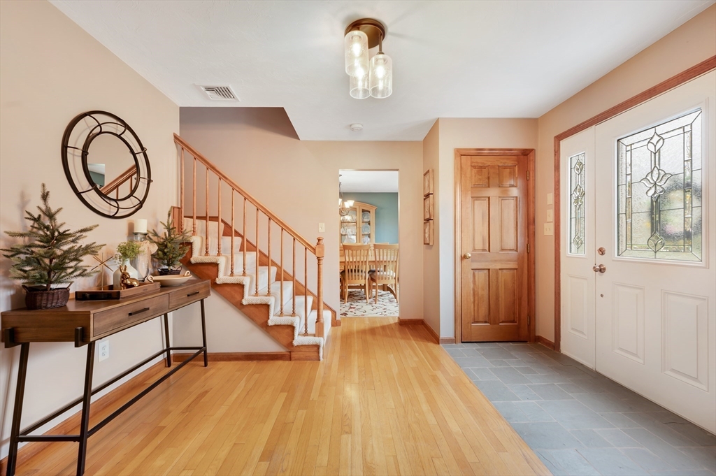 206 Olde Forge Road Hanover, MA 02339 - Photo 3 of 42 a view of an entryway with wooden floor