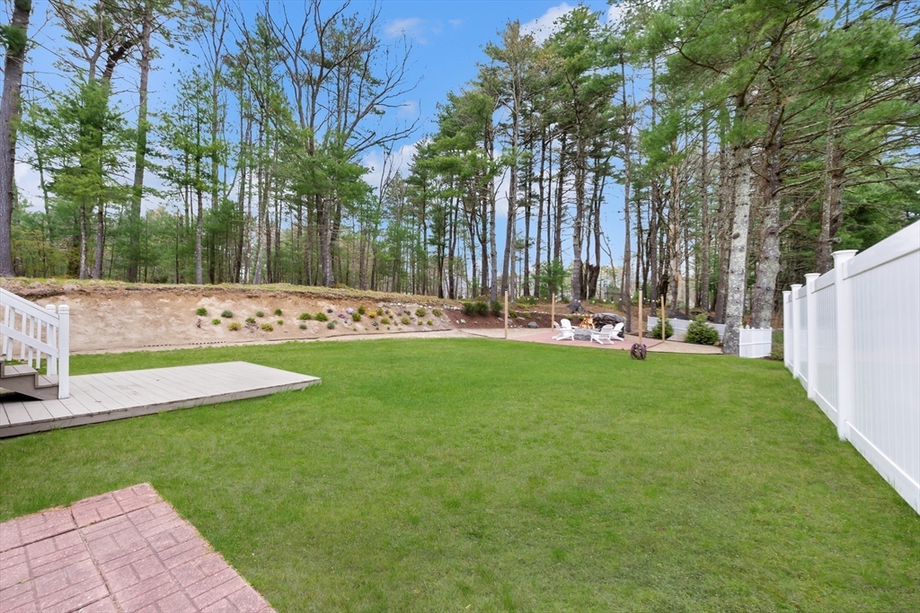 206 Olde Forge Road Hanover, MA 02339 - Photo 35 of 42 a view of an house with backyard and trees