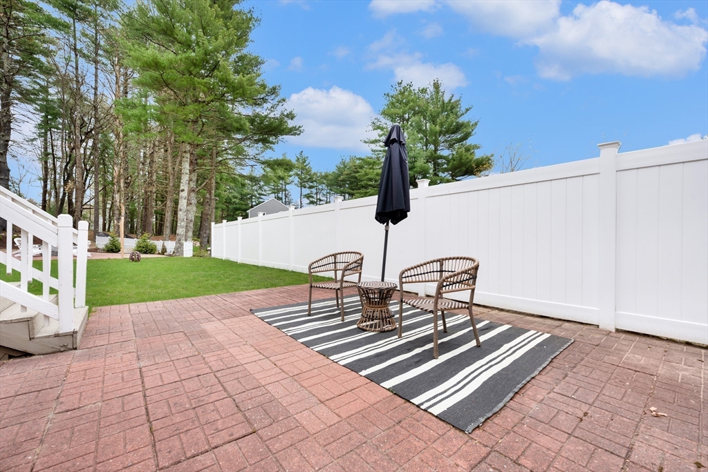 206 Olde Forge Road Hanover, MA 02339 - Photo 36 of 42 a view of backyard with sitting area