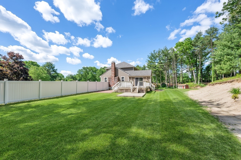 206 Olde Forge Road Hanover, MA 02339 - Photo 40 of 42 a view of a house with backyard and sitting area