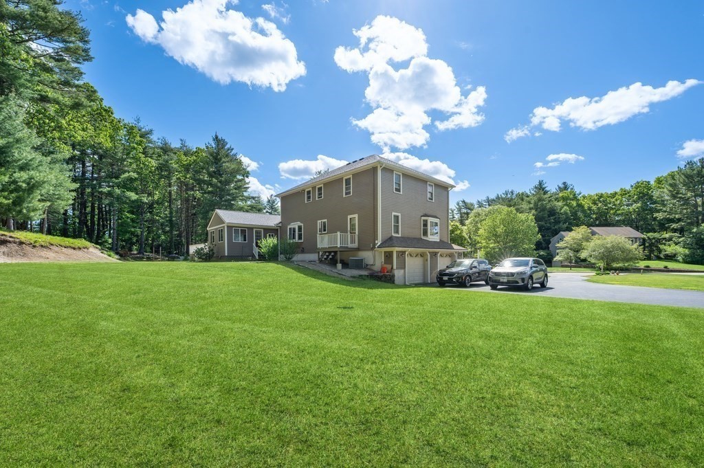 206 Olde Forge Road Hanover, MA 02339 - Photo 42 of 42 a view of a house with a big yard
