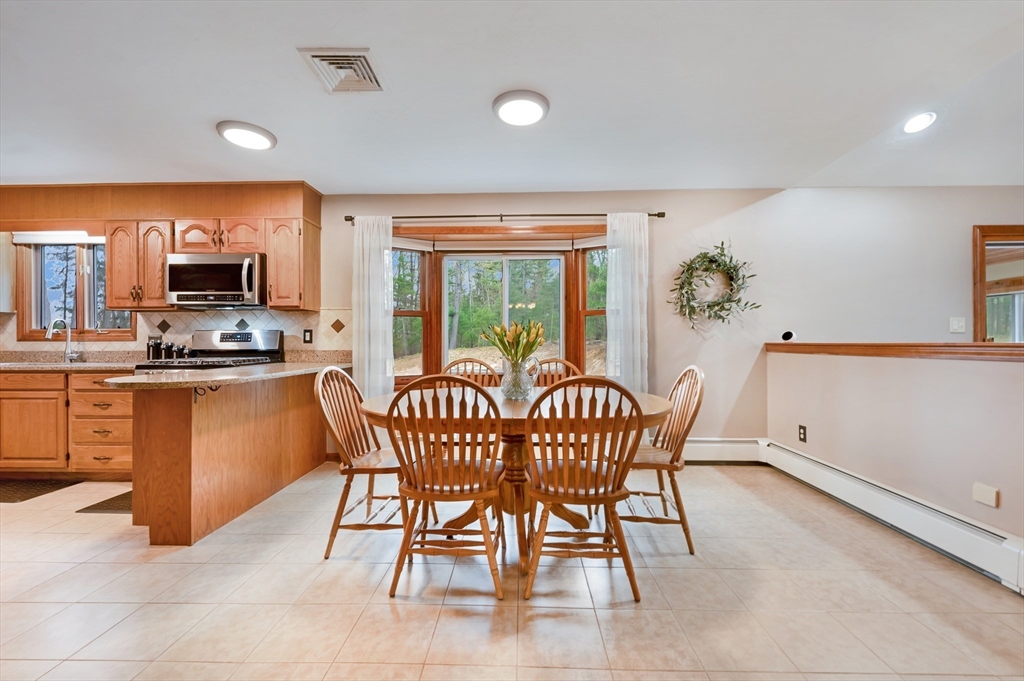 206 Olde Forge Road Hanover, MA 02339 - Photo 7 of 42 a dining room with furniture and window