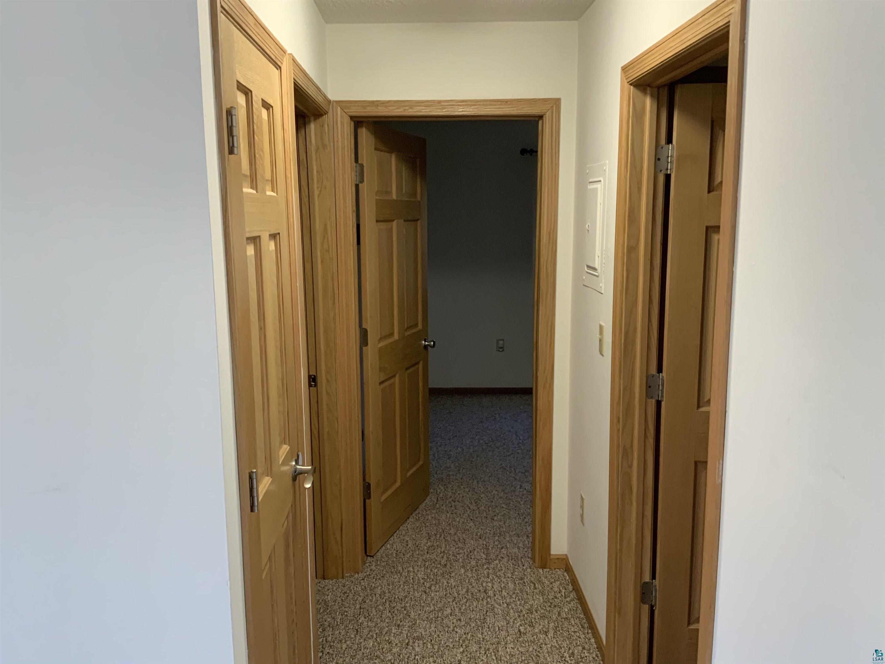 850 Spring Lake Road Cloquet, MN 55720 - Photo 15 of 18 Corridor with carpet floors