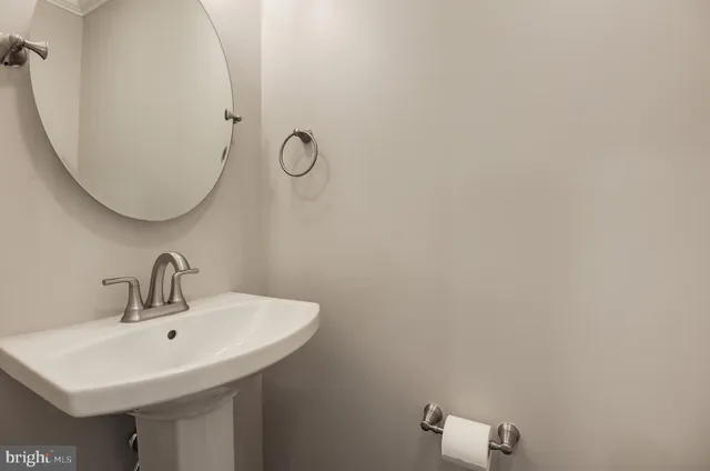 a kitchen with stainless steel appliances a refrigerator and a stove top oven