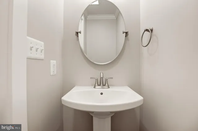 a large kitchen with stainless steel appliances granite countertop a stove a sink and a refrigerator