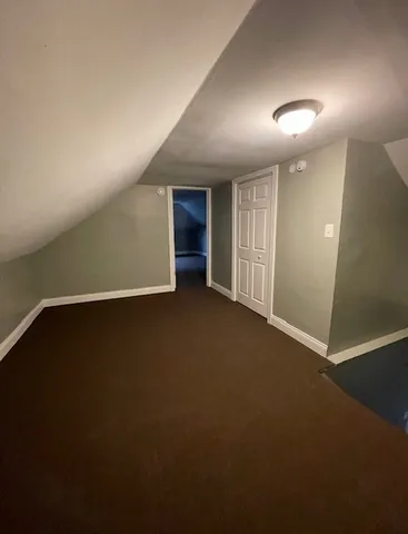an empty room with a door