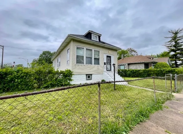 a house view with a garden space
