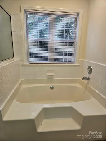 a view of a bathtub in a bathroom