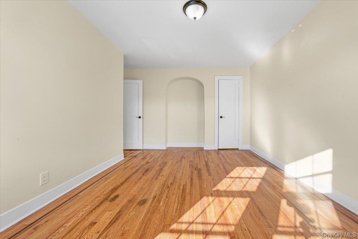 179-67 Selover Road Queens, NY 11434 - Photo 21 of 49 a view of a room with wooden floor