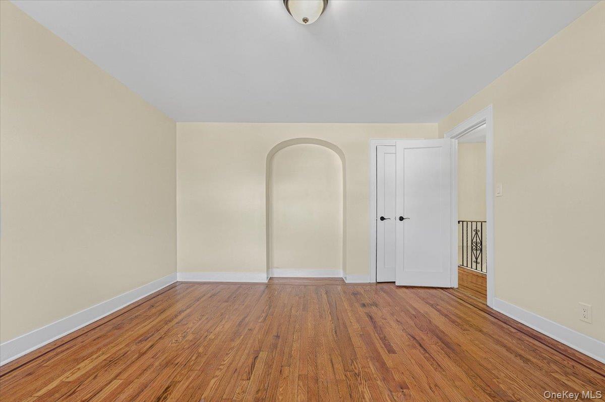 179-67 Selover Road Queens, NY 11434 - Photo 25 of 49 a view of empty room with wooden floor