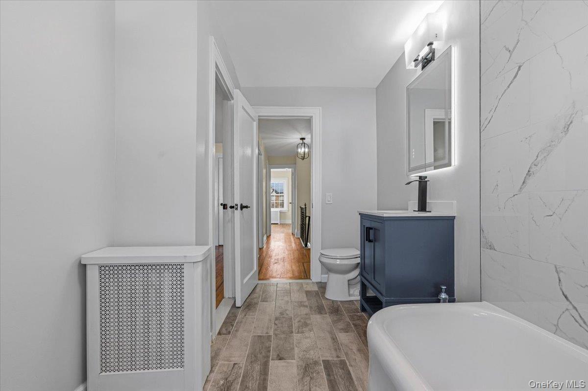 179-67 Selover Road Queens, NY 11434 - Photo 29 of 49 a bathroom with a toilet sink and shower