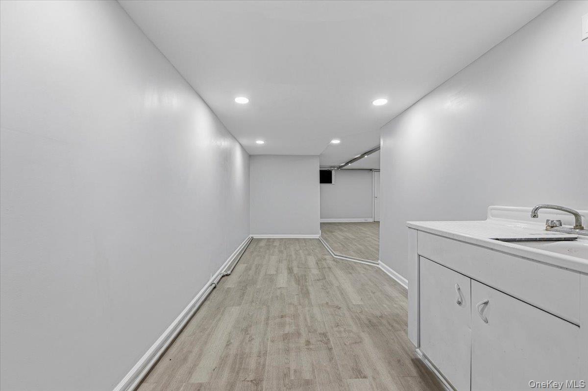 179-67 Selover Road Queens, NY 11434 - Photo 36 of 49 a view of a storage & utility room with wooden floor