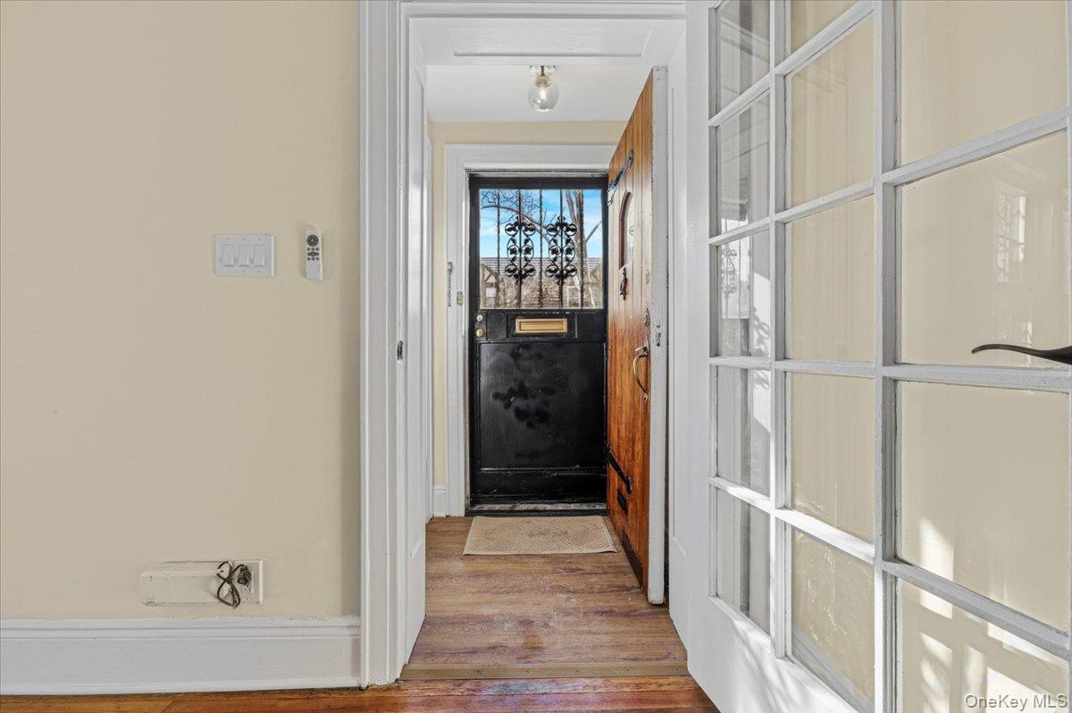 179-67 Selover Road Queens, NY 11434 - Photo 43 of 49 a view of a hallway with wooden floor and staircase