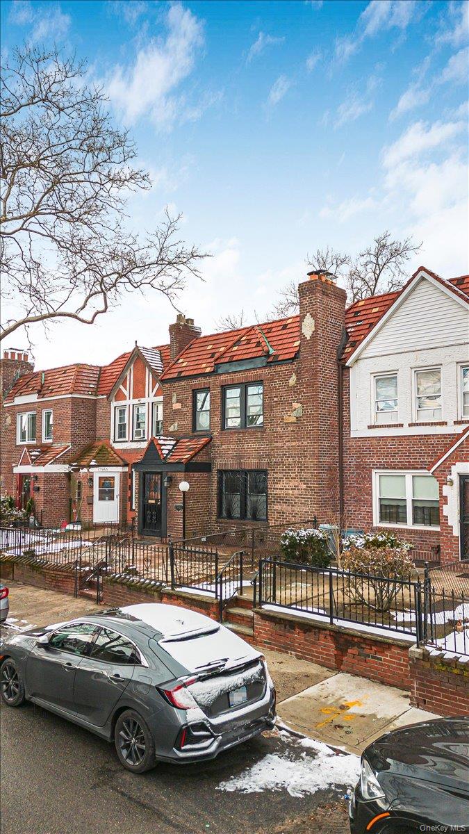179-67 Selover Road Queens, NY 11434 - Photo 46 of 49 a car parked in front of a brick house