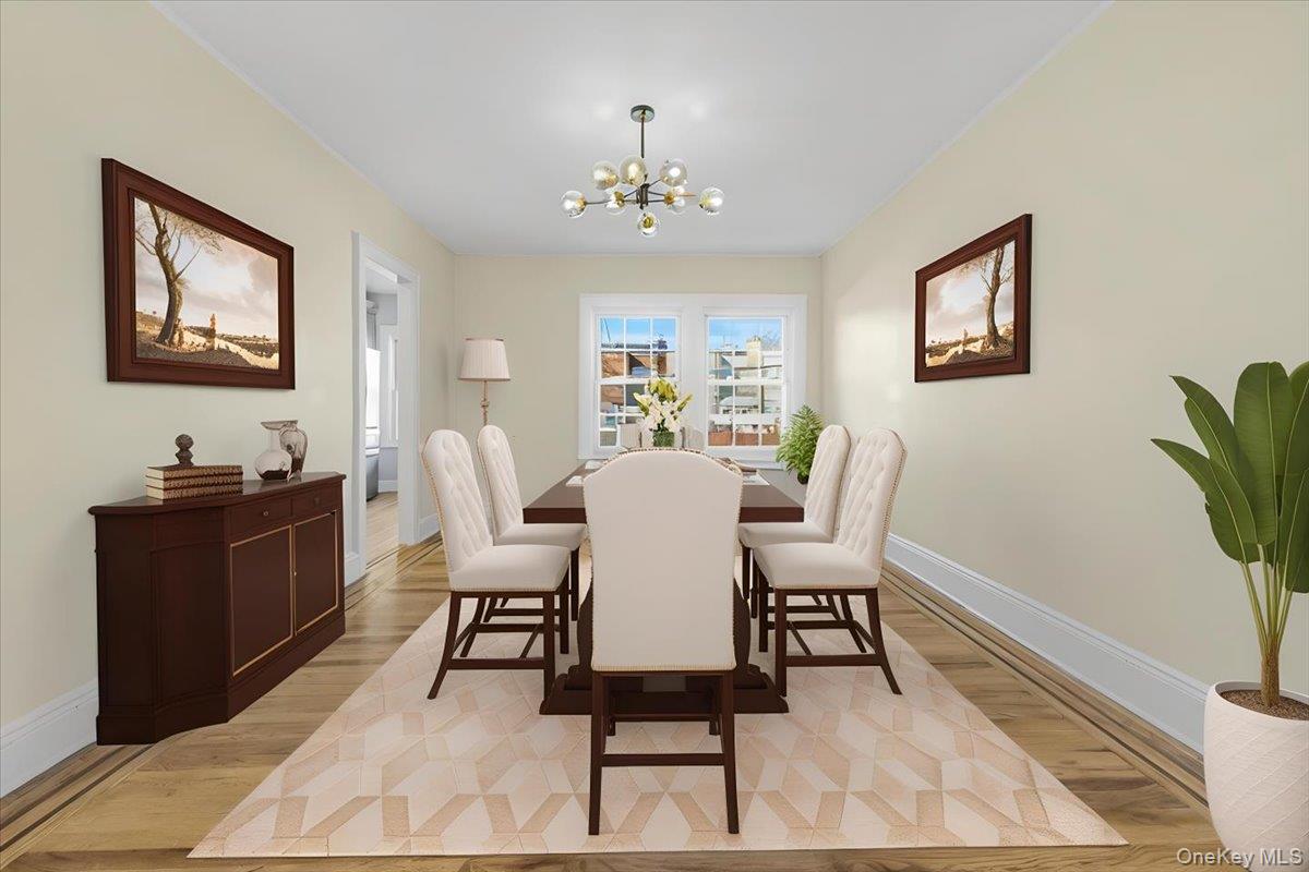 179-67 Selover Road Queens, NY 11434 - Photo 7 of 49 a view of a dining room with furniture wooden floor and a chandelier