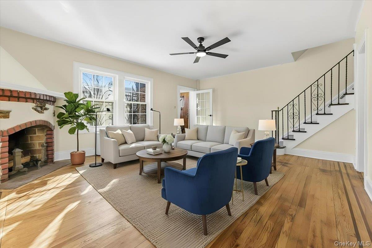 179-67 Selover Road Queens, NY 11434 - Photo 8 of 49 a living room with fireplace furniture and a potted plant