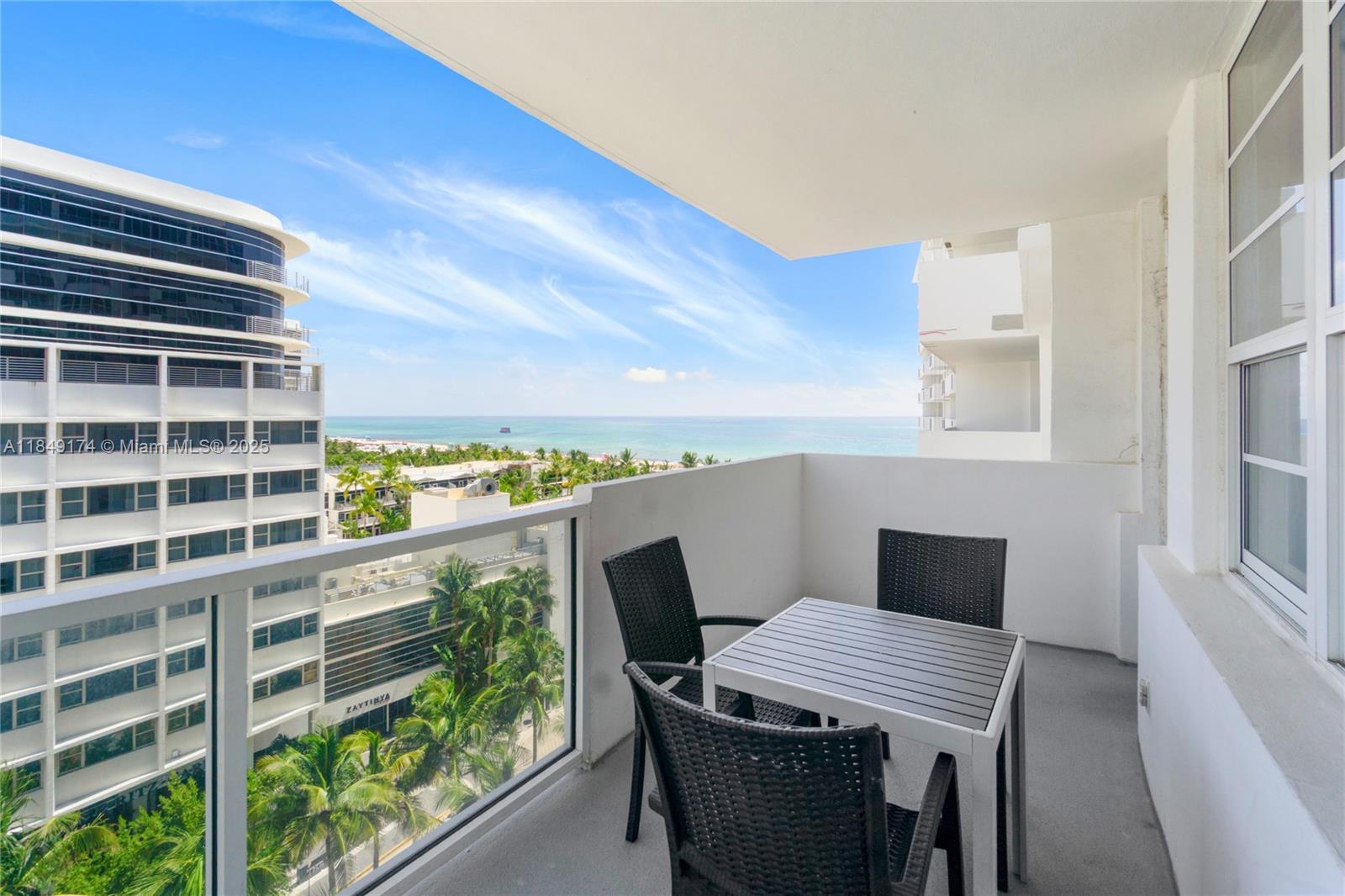 100 Lincoln Road, Unit 923 Miami Beach, FL 33139 - Photo 22 of 31 a view of a balcony dining area with furniture