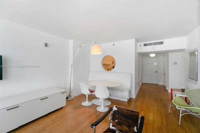 a living room with a couch and a table