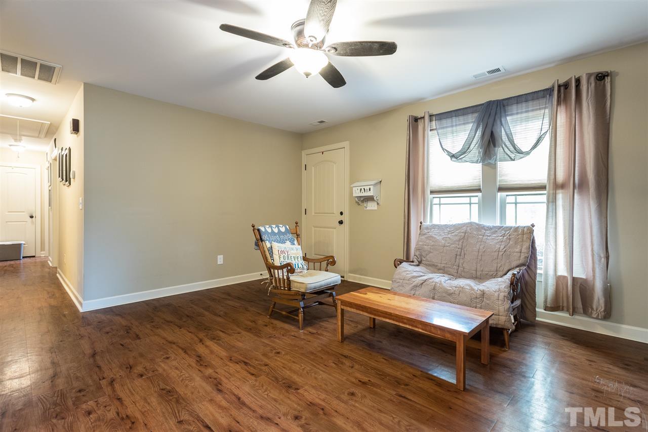 70 Young Road Angier, NC 27501 - Photo 3 of 8 a living room with furniture and a window