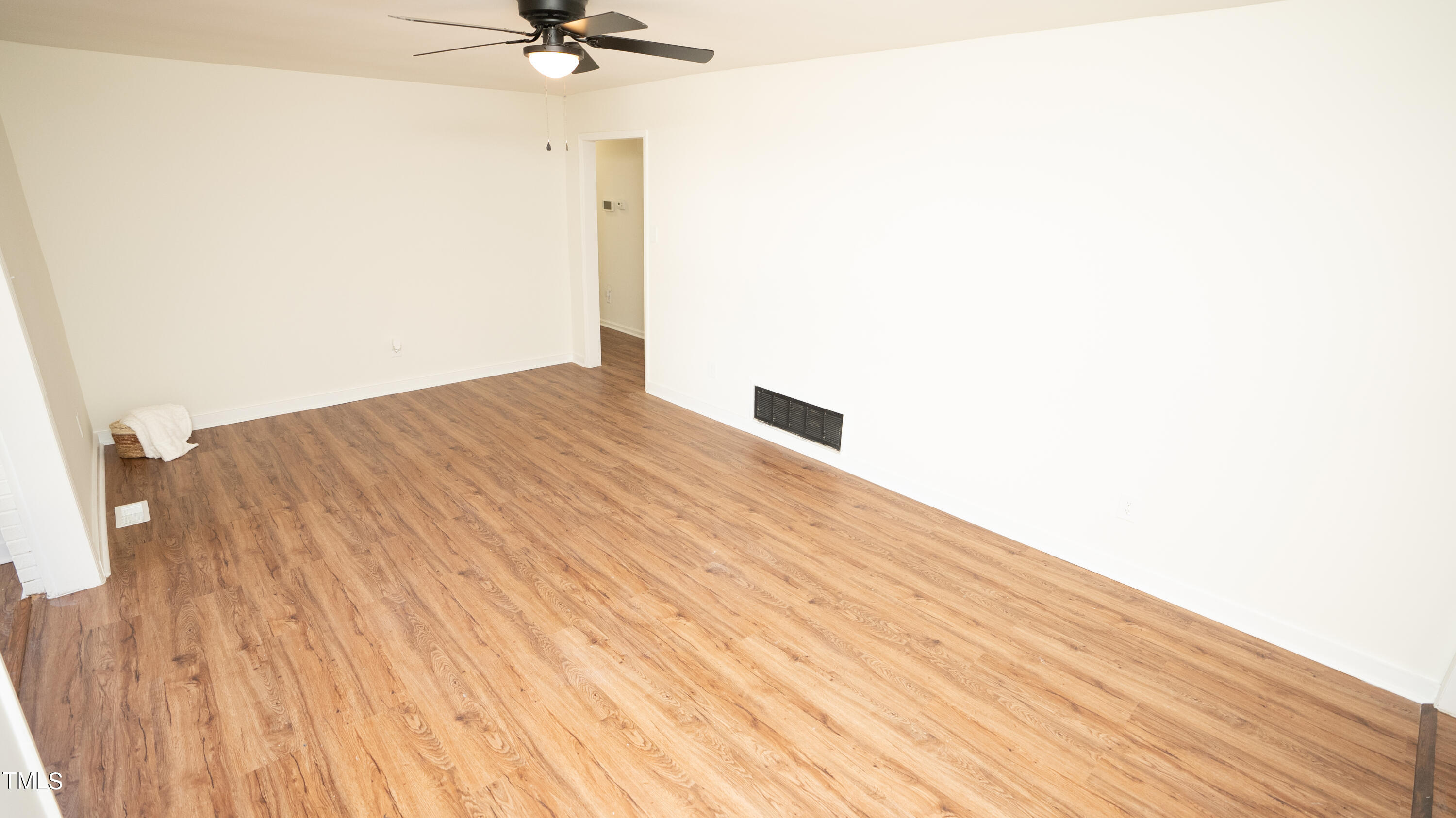 2001 Barwell Road Raleigh, NC 27610 - Photo 32 of 79 a view of a room with a wooden floor