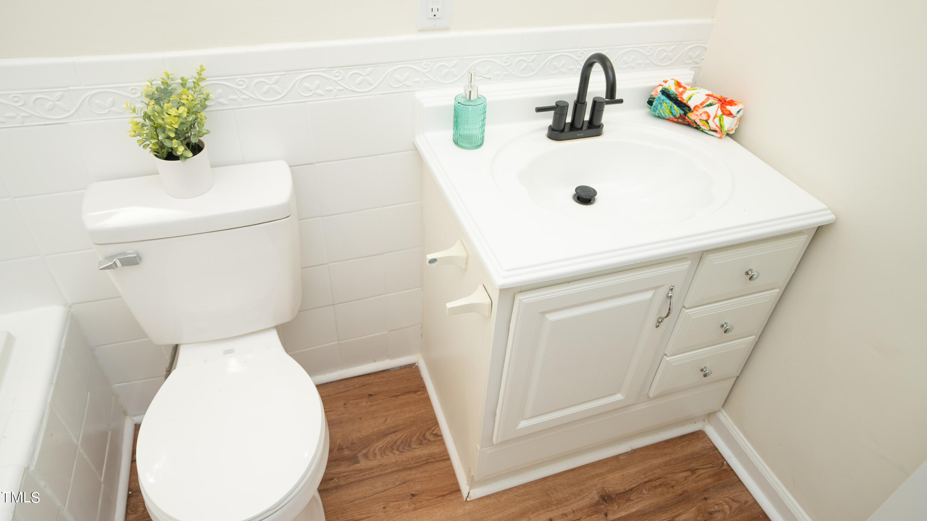 2001 Barwell Road Raleigh, NC 27610 - Photo 41 of 79 a bathroom with a sink and toilet
