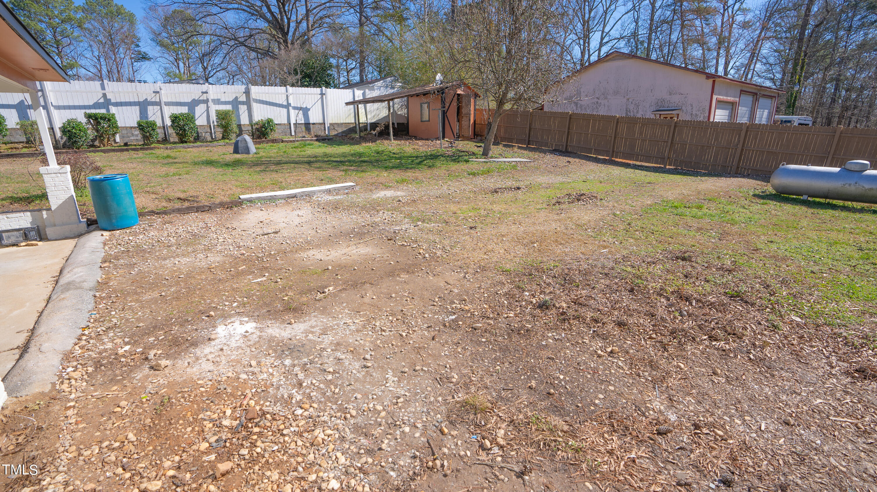 2001 Barwell Road Raleigh, NC 27610 - Photo 47 of 79 a view of a backyard with large trees