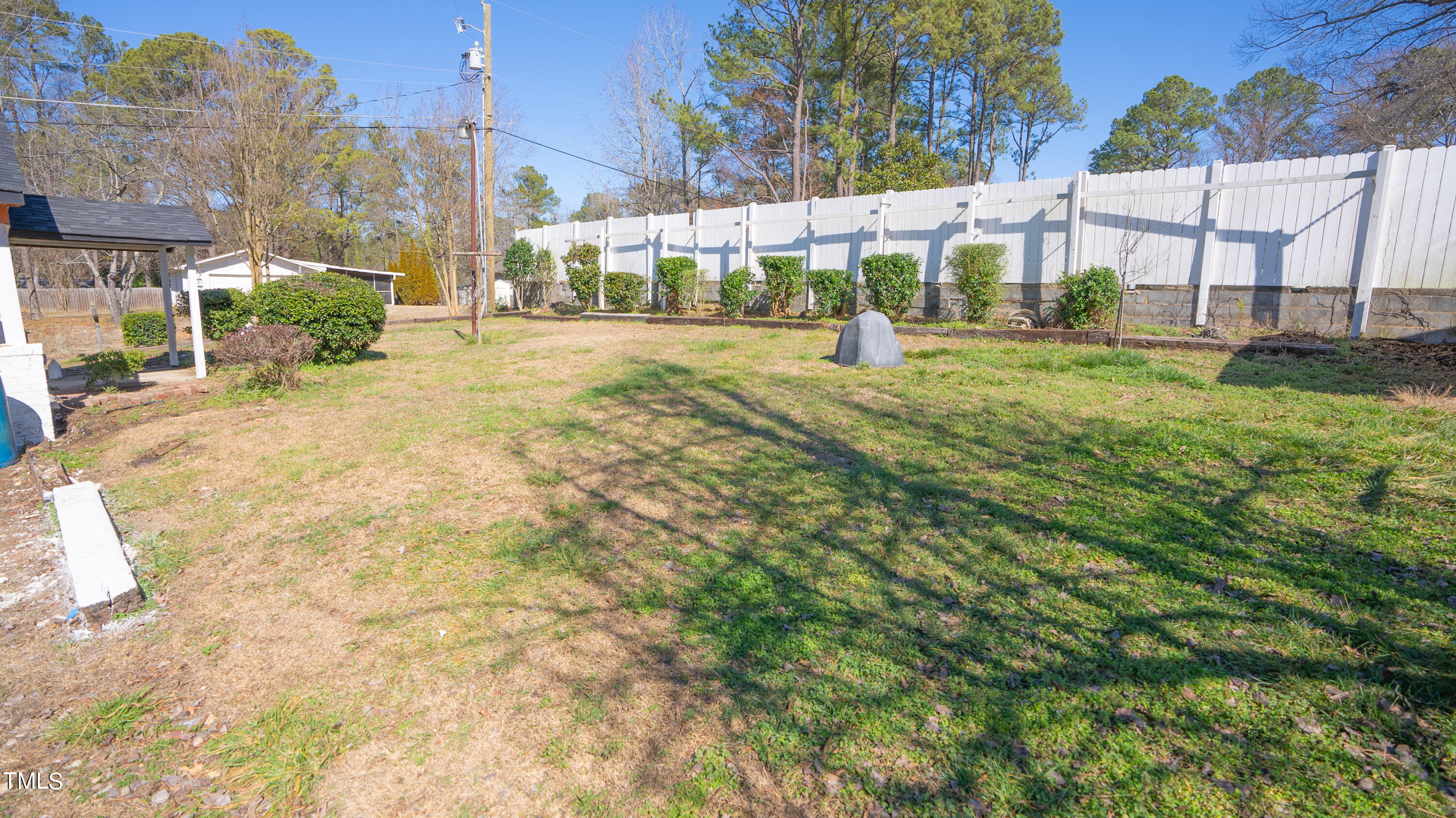 2001 Barwell Road Raleigh, NC 27610 - Photo 52 of 79 a view of a building with a big yard and fountain