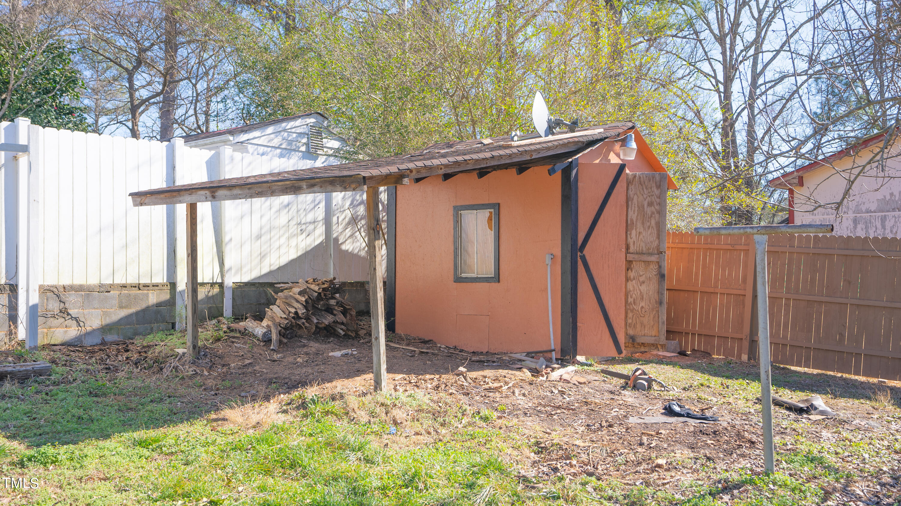 2001 Barwell Road Raleigh, NC 27610 - Photo 53 of 79 a backyard of a house with a tree