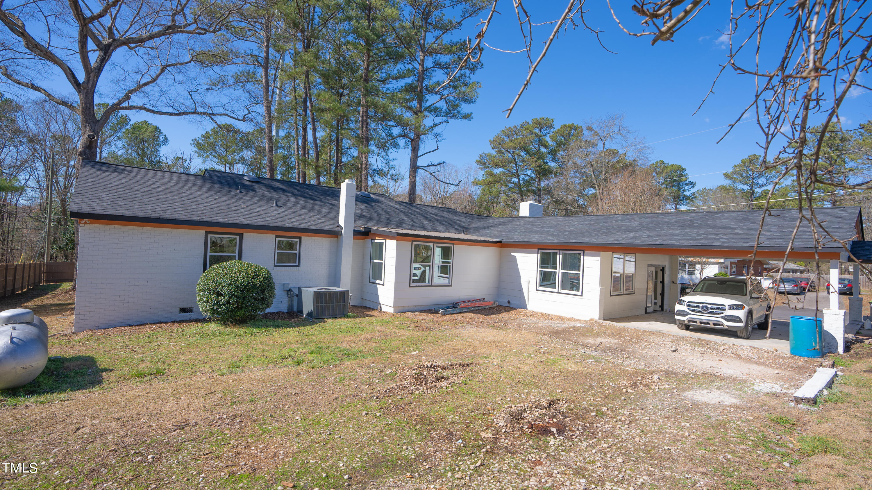 2001 Barwell Road Raleigh, NC 27610 - Photo 55 of 79 a view of a house with a yard and garage