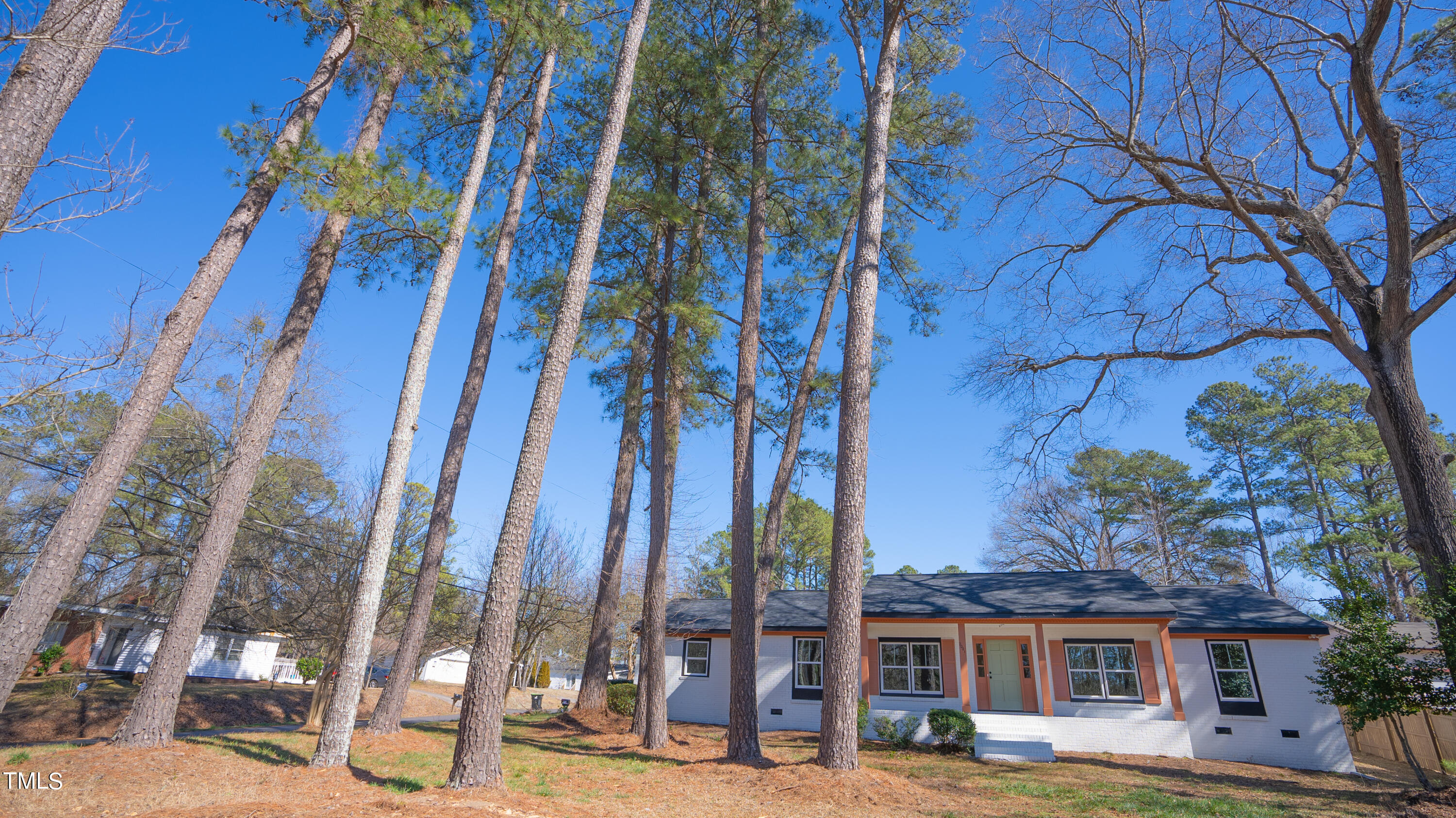 2001 Barwell Road Raleigh, NC 27610 - Photo 64 of 79 front view of a building with a tree