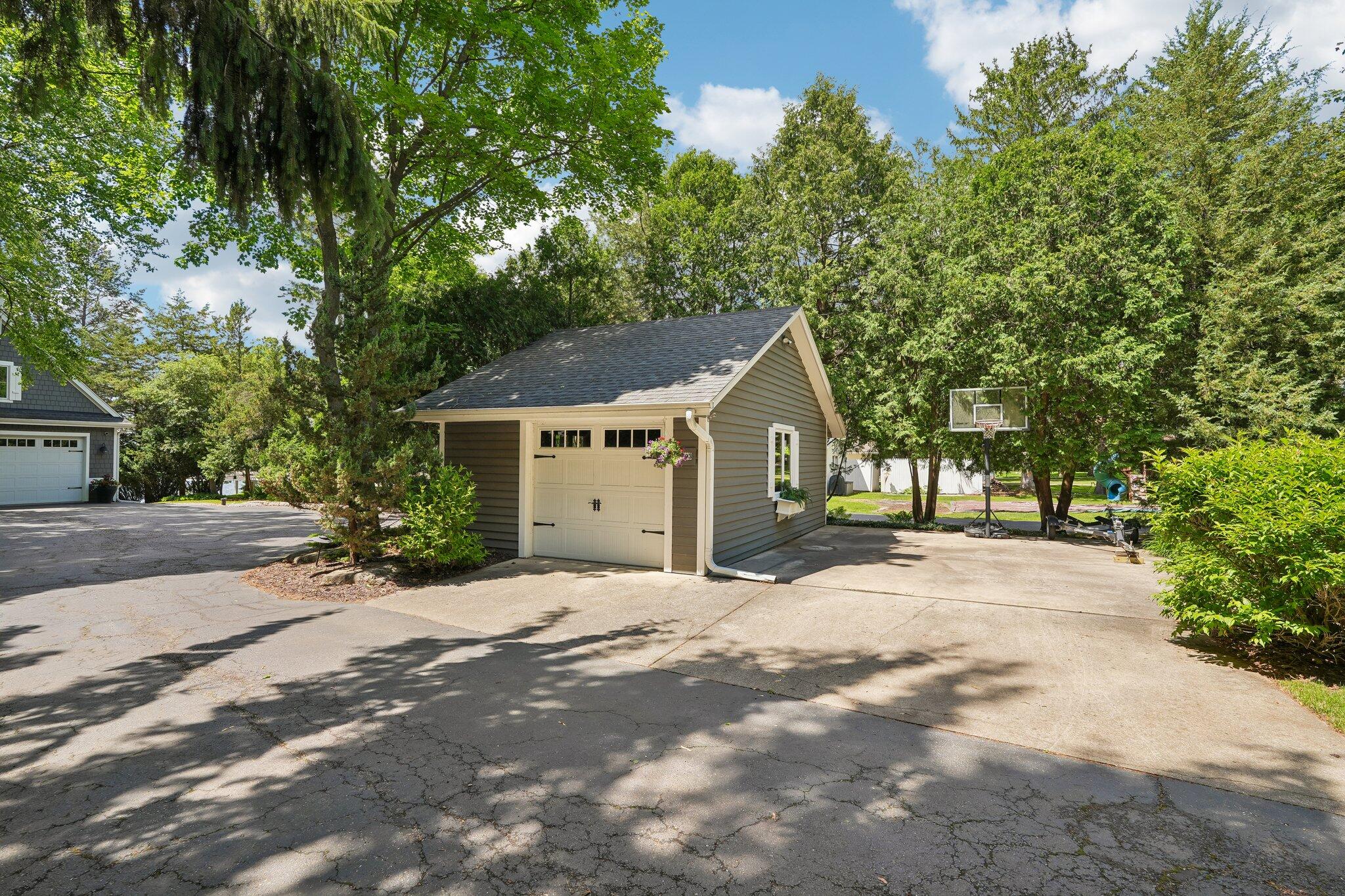 W343N6293 South Bayview Road Oconomowoc, WI 53066 - Photo 6 of 104 Detached garage and extra parking
