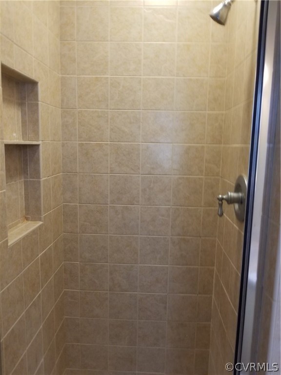 14421 Rosebud Road Chesterfield, VA 23838 - Photo 9 of 25 a bathroom with a shower