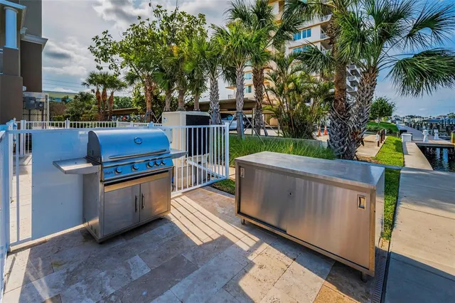 a view of a backyard with sitting area