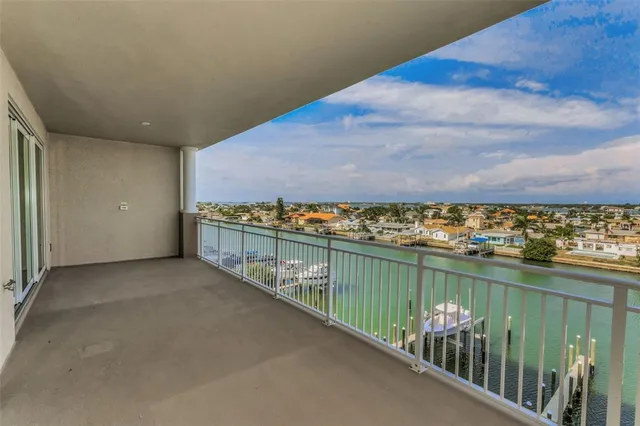 a view of a balcony with an ocean