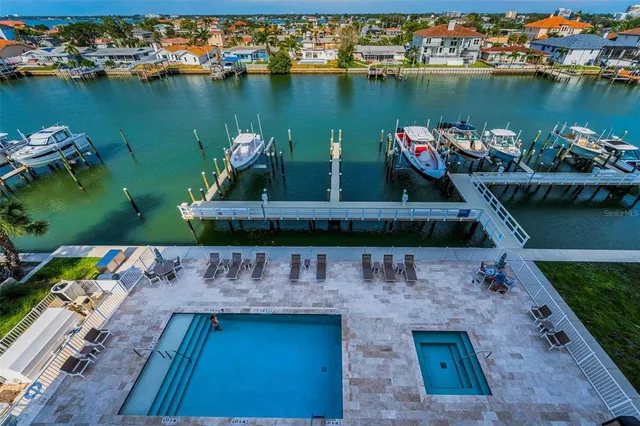 an aerial view of a house with a ocean view