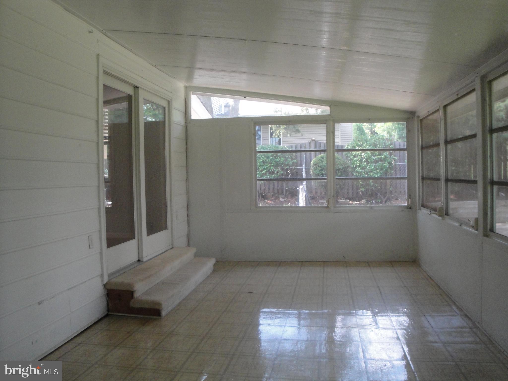 1825 Opalocka Drive McLean, VA 22101 - Photo 22 of 29 Sunroom with door to Family Room