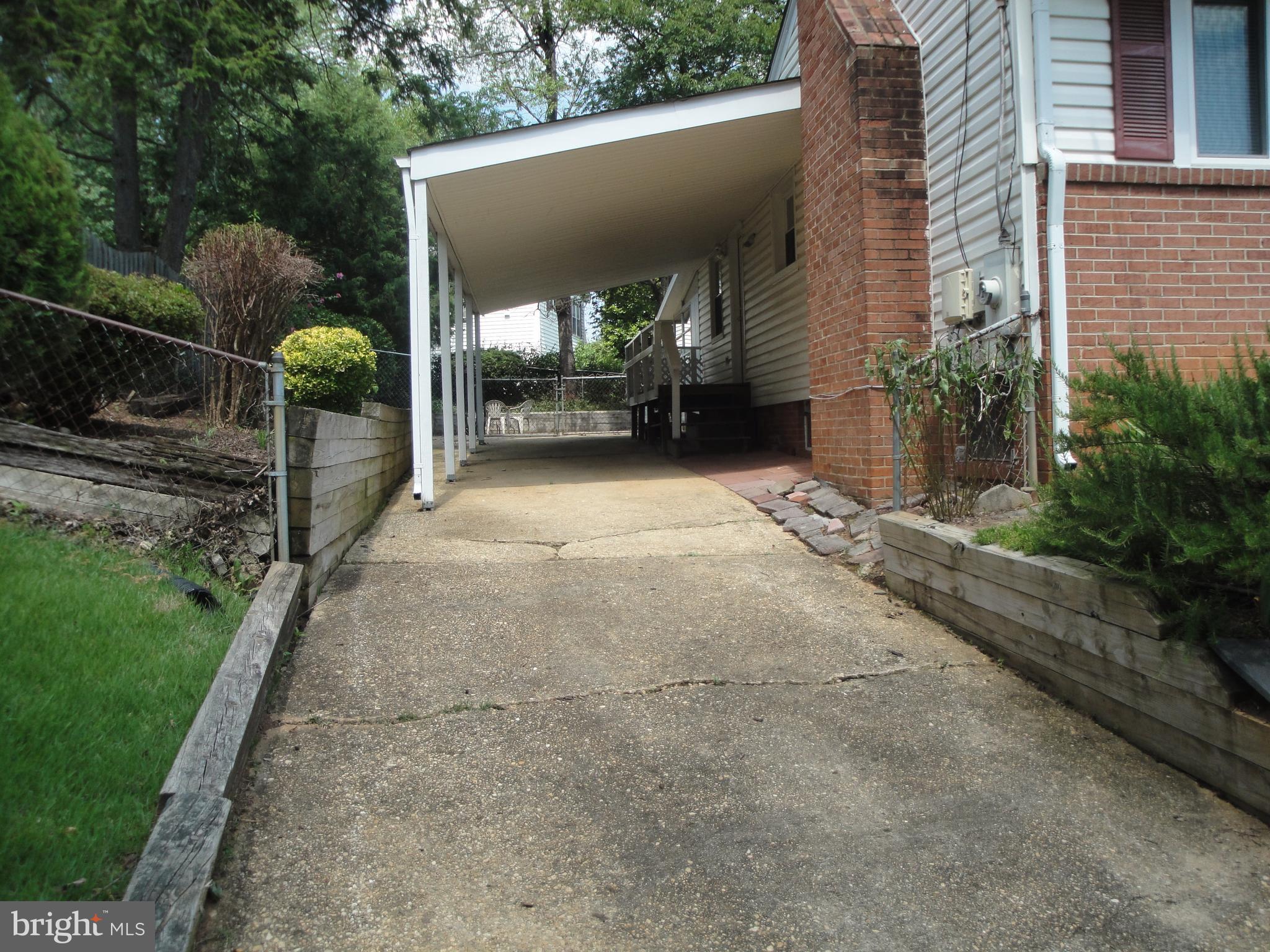 1825 Opalocka Drive McLean, VA 22101 - Photo 27 of 29 Driveway to Carport with Kitchen Side Entry