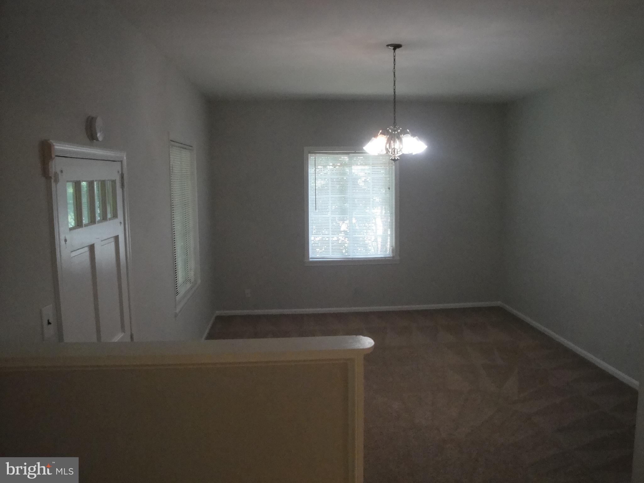 1825 Opalocka Drive McLean, VA 22101 - Photo 10 of 29 1 yr old Carpeted Den with Door to Sunroom