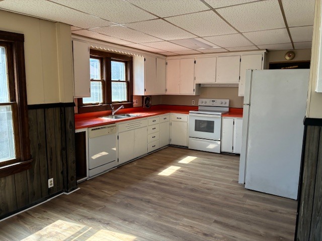 708 South 1st Street DeKalb, IL 60115 - Photo 4 of 17 a kitchen with a sink cabinets and wooden floor