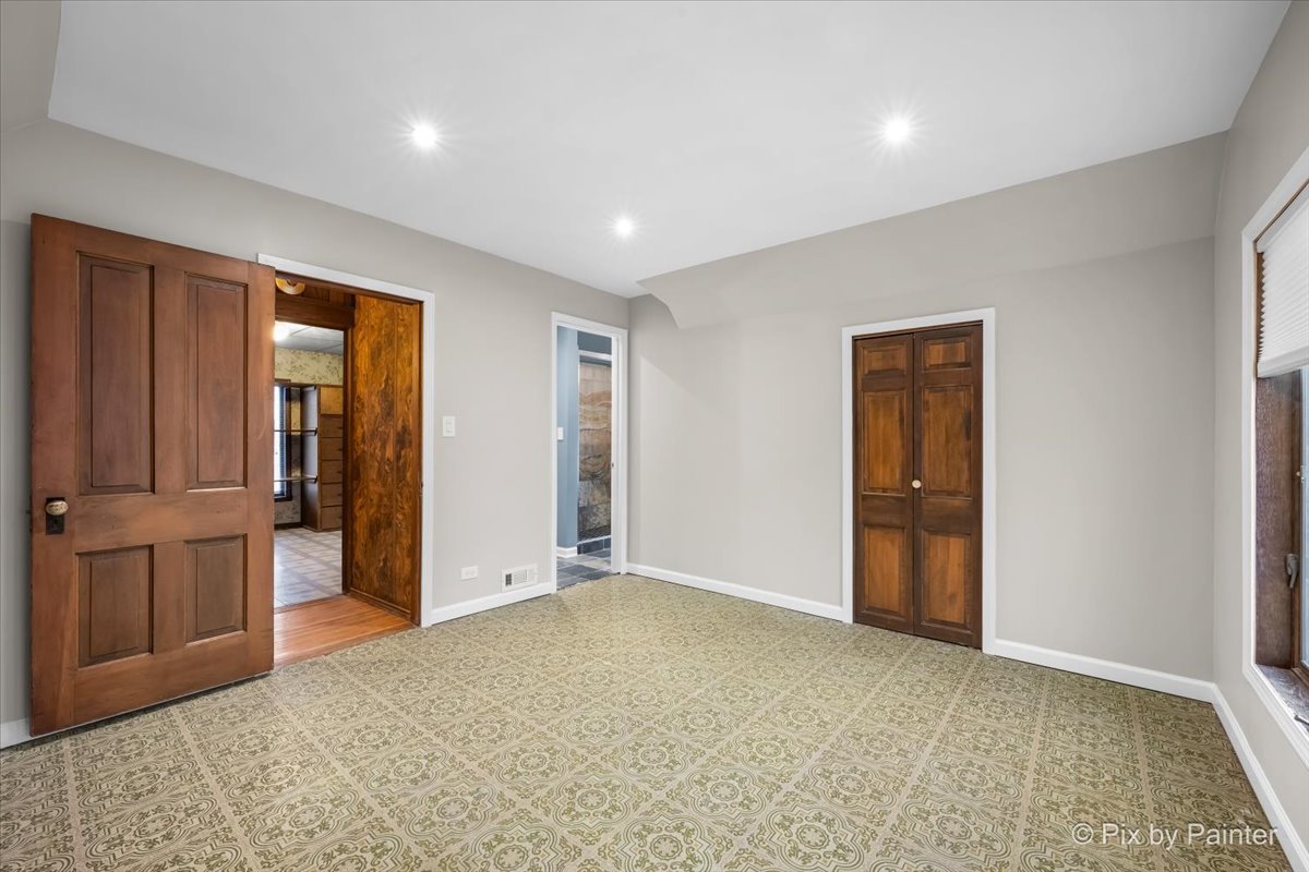 708 South 1st Street DeKalb, IL 60115 - Photo 10 of 17 a view of an empty room