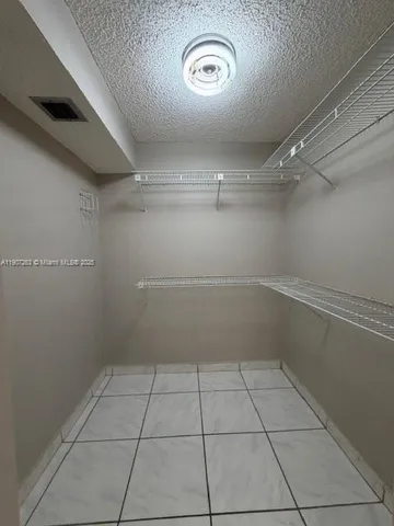 a view of a livingroom with wooden floor