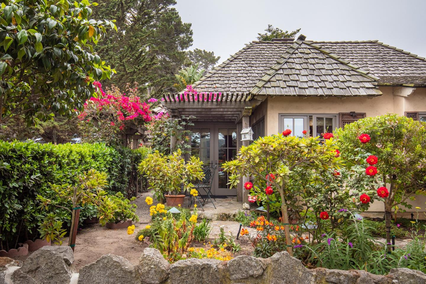 0 Southeast Se Corner Carmel, CA 93923 - Photo 19 of 21 a front view of a house with a fountain