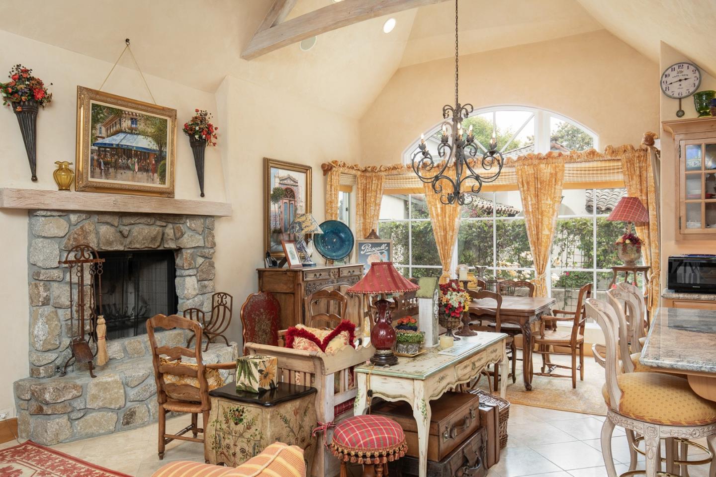 0 Southeast Se Corner Carmel, CA 93923 - Photo 7 of 21 a living room with furniture a chandelier and a fireplace