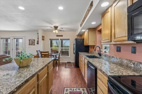 a kitchen with granite countertop lots of counter top space