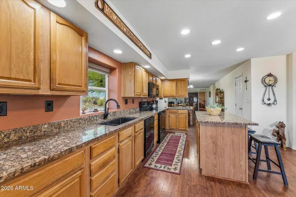 a kitchen with lots of counter top space and cabinets