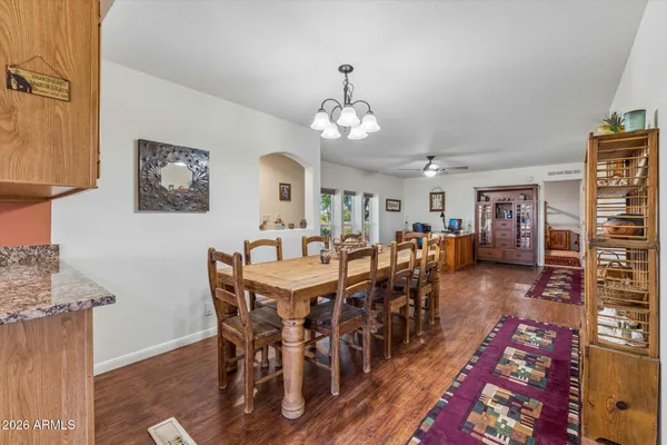 a view of a dining room with furniture