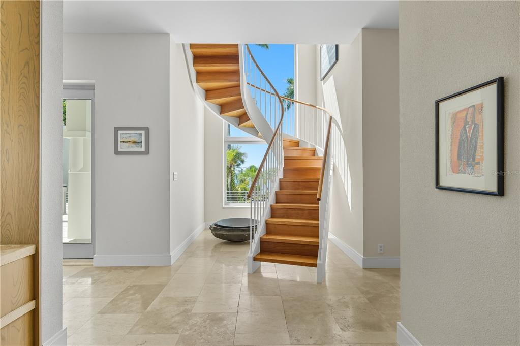 3315 Bay Shore Road Sarasota, FL 34234 - Photo 66 of 96 a view of entryway and hall with wooden floor